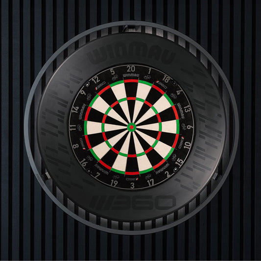 Dartboard with a black and white design on a dark textured background
