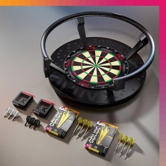 Omni Ultimate home bundle includes TOR dartboard, Omni Black Surround, Bolide darts, and K-Flex accessories on a gray surface