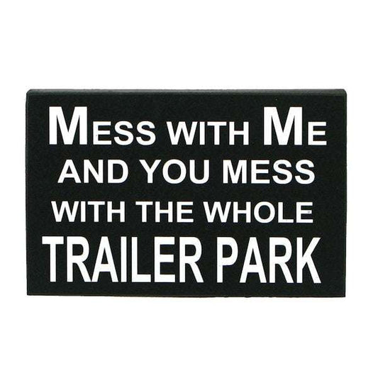 Black MDF shelf plaque with white text "Mess with Me and You Mess with the Whole Trailer Park" sign