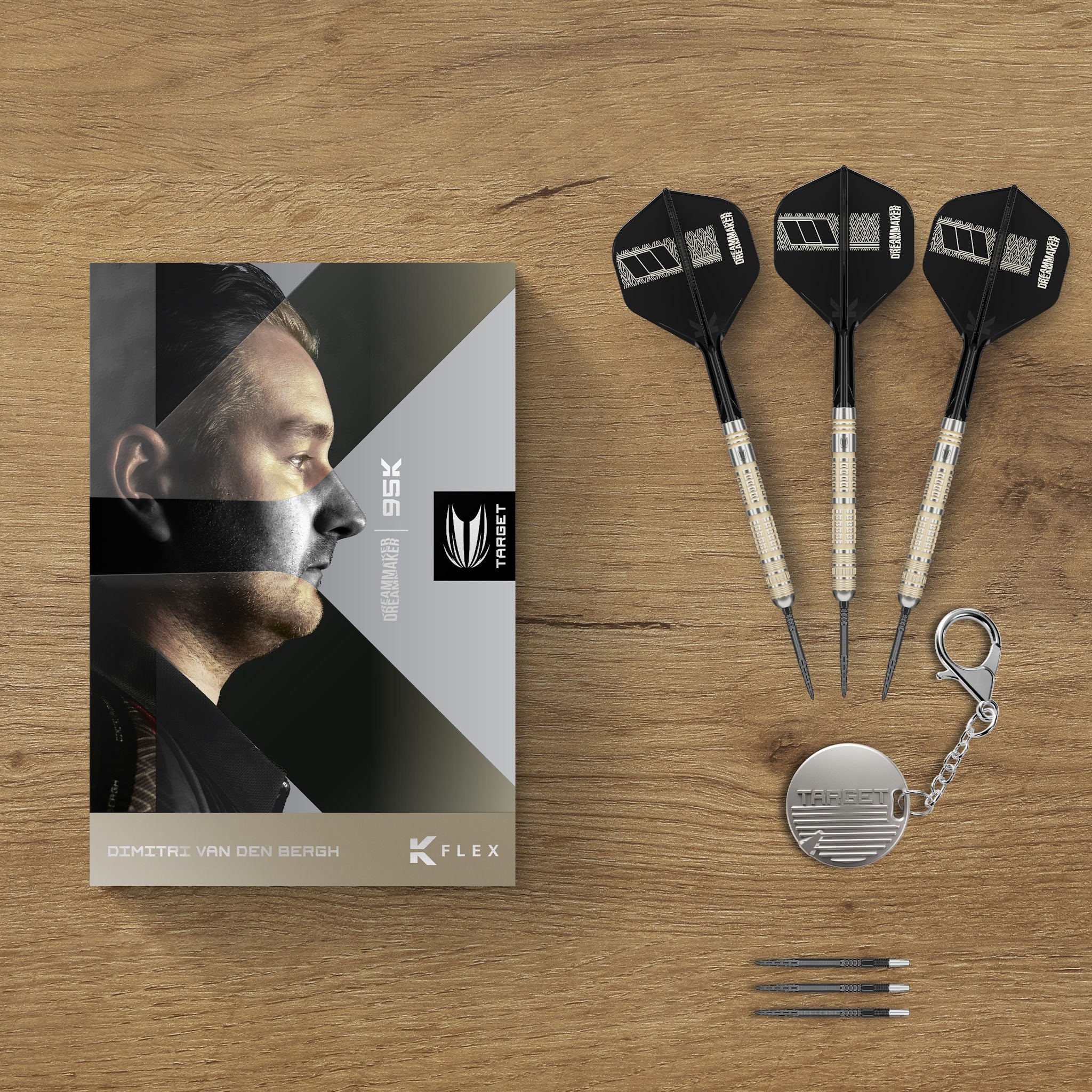 Dart set with packaging on a wooden surface