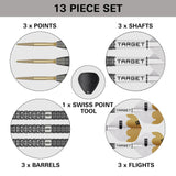 13-piece dart set with points, shafts, Swiss point tool, barrels, and flights on a gray background.