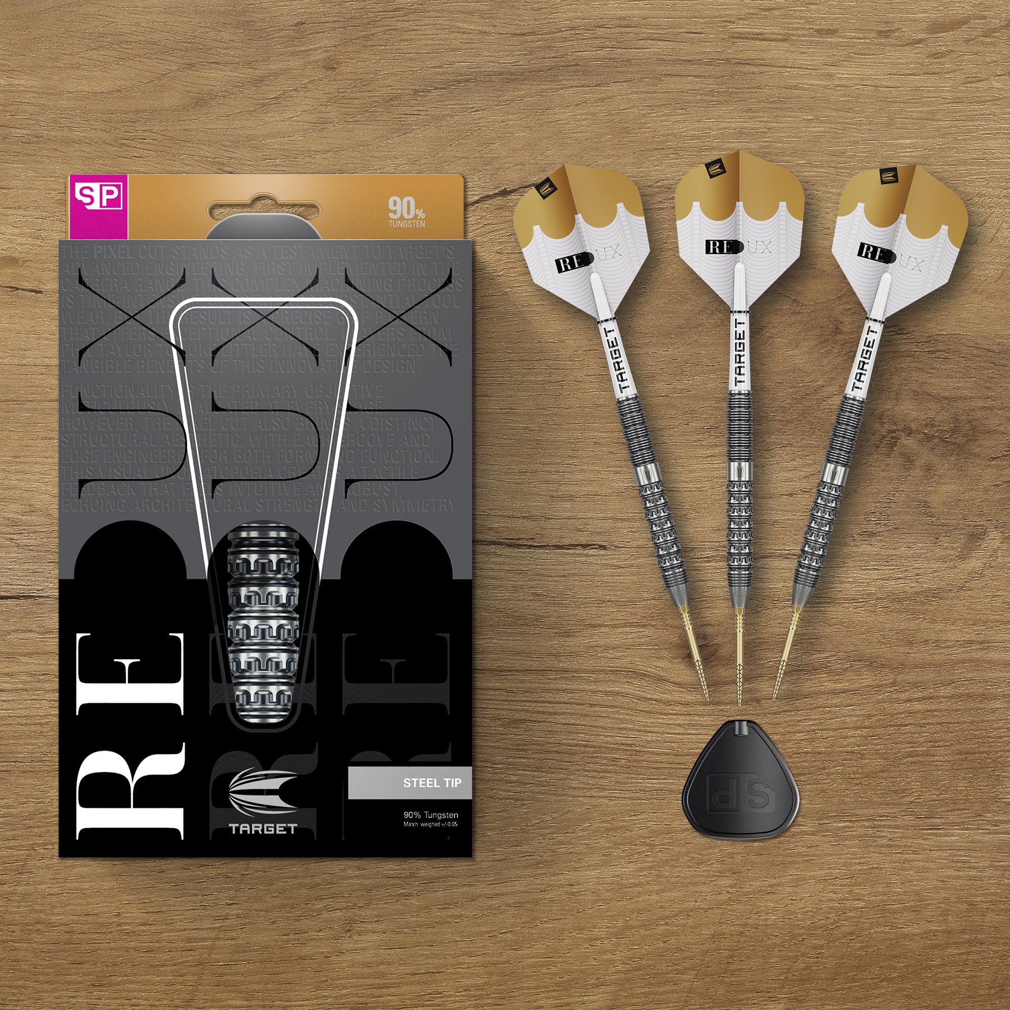 Redux 90% SP Tungsten Darts with packaging on a wooden surface