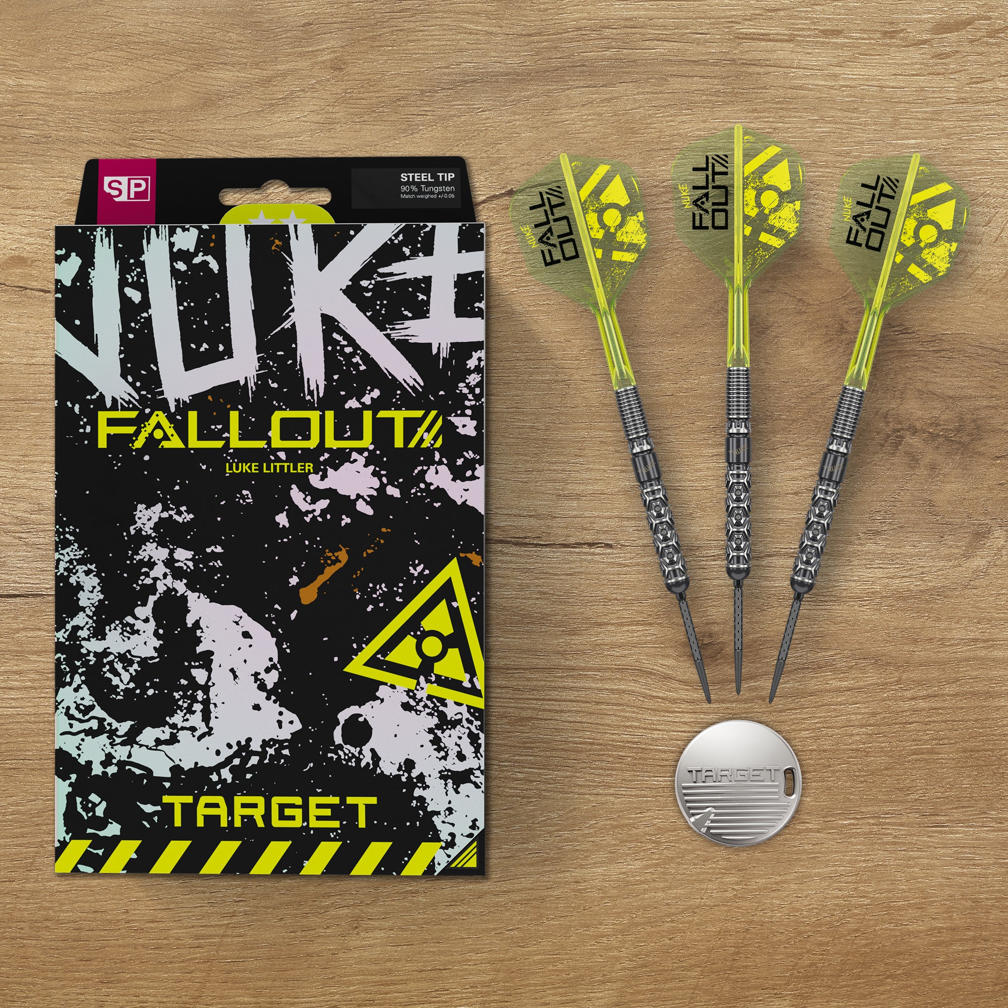 Luke Littler Nuke Fallout SP 90% Tungsten Darts on wood surface.