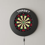 Target Black Notched Surround showing on the wall with a dartboard
