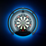 A Target Corona Vision 2 Light with a glowing blue surround and illuminated target face, centered on a dark blue background. The board has black, white, red, and green scoring sections with the brand name TARGET visible near the center and bottom.