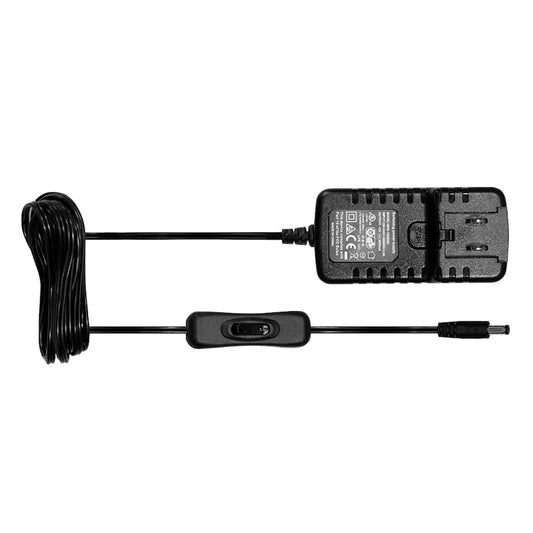 Black power adapter with cable on a white background
