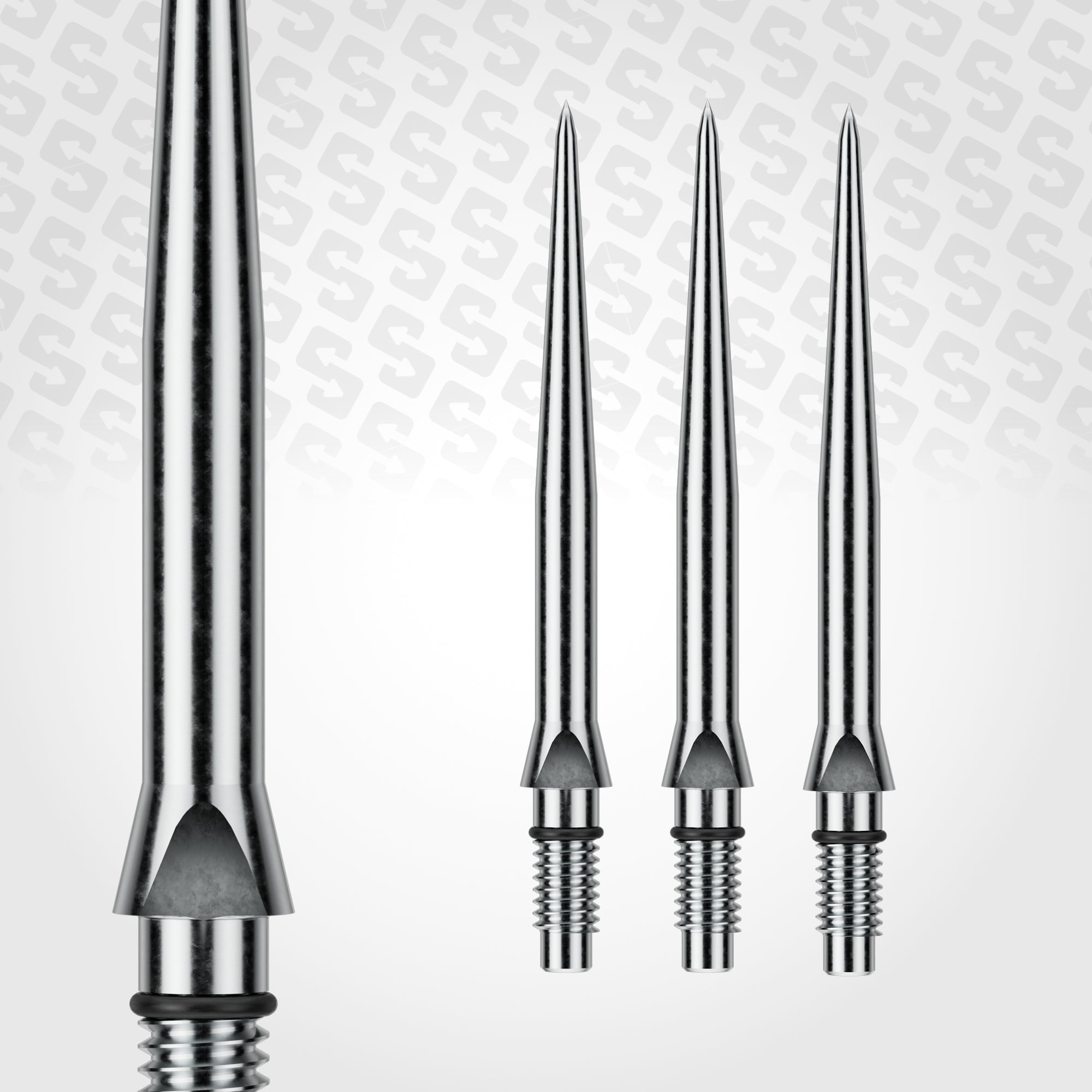 Set of metallic darts on a light gray background