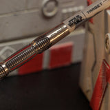 Close-up of a Target brand dart with a blurred background