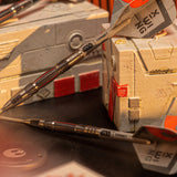 STAR WARS™ X-Wing 90% SP Darts two darts with 'X-Wing' labels on a Target 3d block background